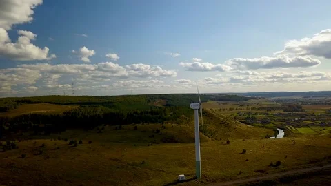 Working electric wind generators feeding the village Stock Footage 81518258