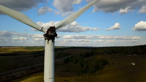 Working electric wind generators feeding the village Stock Footage 81521498