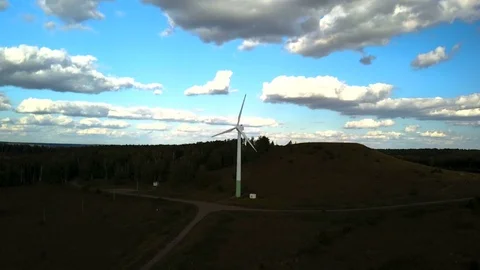 Working electric wind generators feeding the village Stock Footage 81524512
