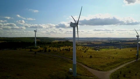 Working electric wind generators feeding the village Stock Footage 81525464