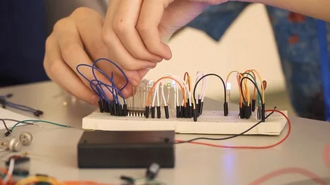 Working with electronic constructor Stock Footage 86856569