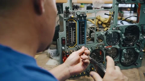 The working electronics engineer disassembles the mechanism Stock Footage 155211515