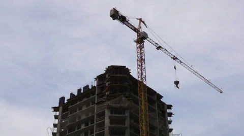 Working elevating crane on a construction site. Time lapse. Stock Footage 39383371