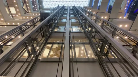 Working elevator with lighting in a shopping mall. Stock Footage 247453461
