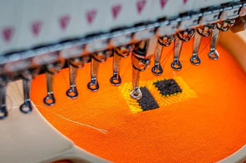 Working embroidery machine closeup Stock Photos