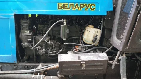 Working engine of the tractor Belarus Stock Footage 114068425