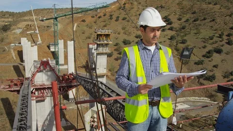 Working, Engineer, Construction, Construction Site, Bridge, Standing, Looking At Stock Footage 95817162