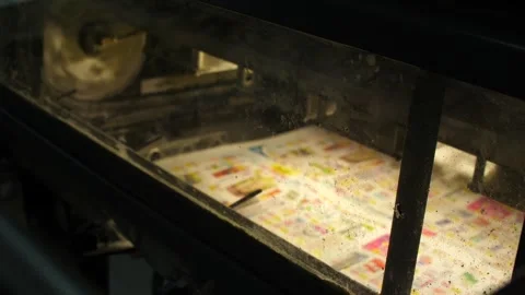 Working equipment on conveyor line in printing house with newspapers. Stock Footage 262545343