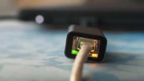 Working ethernet cable adapter with green LED and flashing yellow LED. Ethernet Stock Footage 286700777