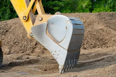 Working excavator bucket Stock Photos