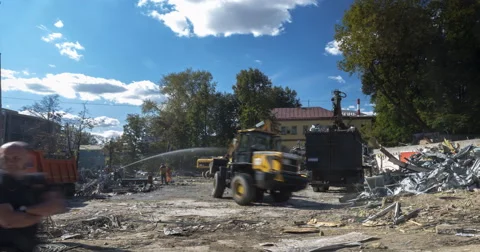 Working of excavator by demolition of building Stock Footage 67144002