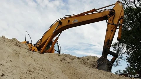 Working excavator on a modern construction site Stock Footage 88981618