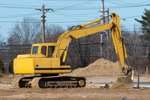Working excavator on site Stock Photos