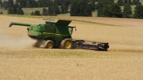 Working farm plowing of a field Stock Footage 78523187