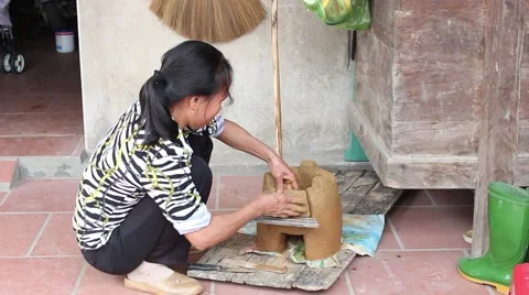 Working in the fields, doing soil oven Stove Stock Footage 49699114