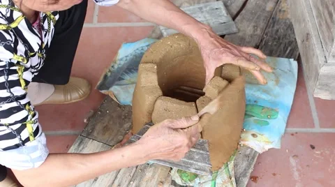 Working in the fields, doing soil oven Stove Stock Footage 49699154