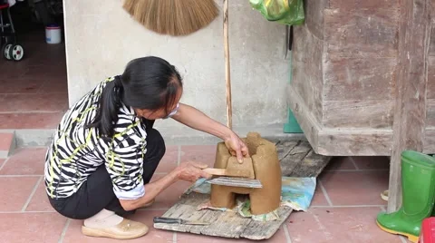 Working in the fields, doing soil oven Stove Stock Footage 49699251