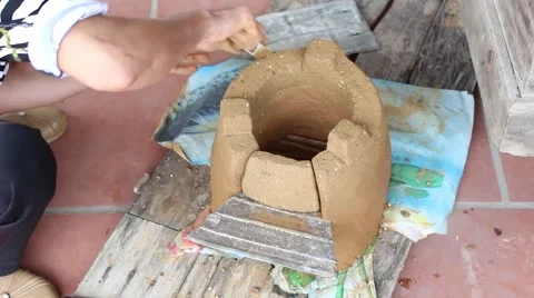 Working in the fields, doing soil oven Stove Stock Footage 49699303