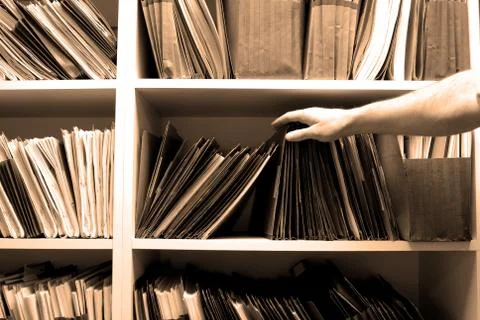 Working on Files in a File Room Stock Photos