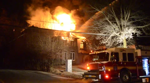 Working Fire in a Mansion with fire trucks 2 Stock Footage 35698218
