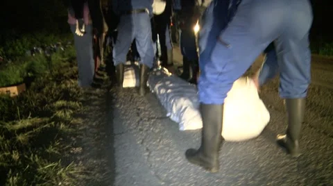 Working in Flood Stock Footage 50889659