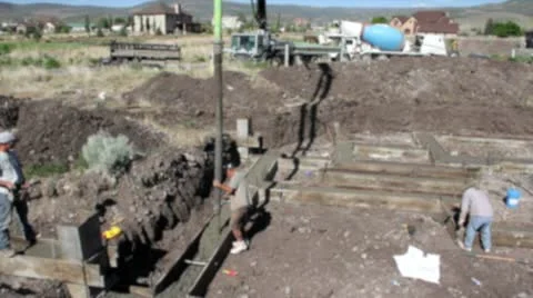 Working on Footings for House Stock Footage 11244765