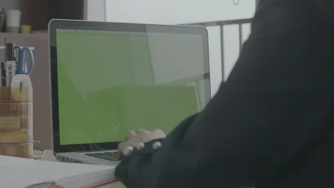 Working on a green screen computer in the office Stock Footage 129067674