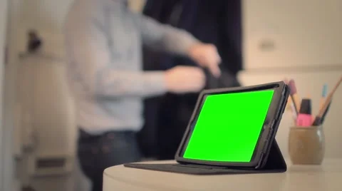 Working on Green Screen tablet and then Leaving the Office - 1080p Stock Footage 54819958