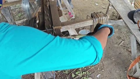 Working hand blending on the metal bar Stock Footage 296453396