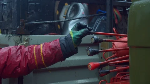 Working hand runs operating the old machine, turn the lever handle. Clouse up. Stock Footage 129101904