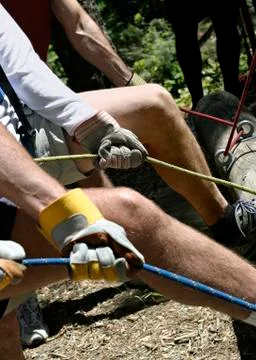 Working hands on belay Stock Photos