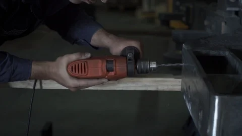 Working hands drill metal. Drill screwdriver workflow creation Stock Footage 99702962