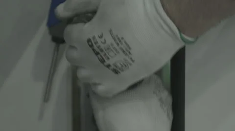 Working Hands in Gloves Stock Footage 33444512