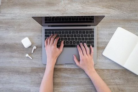 Working hands on laptop Stock Photos