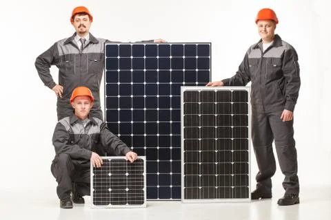 Working hard hat with solar panels in the studio Stock Photos