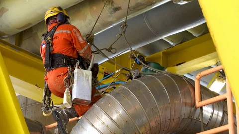 Working At Height Via Abseiling. Stock Footage 129636182