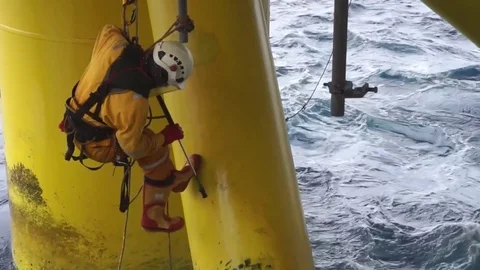 Working at height and overboard using abseiling technique. Stock Footage 83605506
