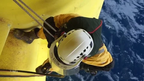 Working at height and overboard using abseiling technique. Stock Footage 83605524