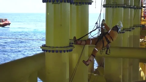 Working at height and overboard using abseiling technique. Video stock 83605527