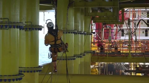 Working at height and overboard using abseiling technique. Video stock 83605535