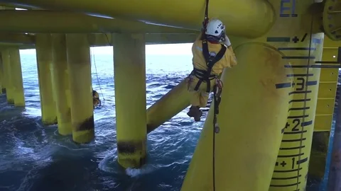 Working at height and overboard using abseiling technique. Stock Footage 83605567