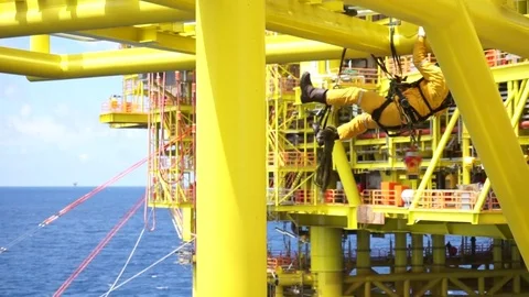 Working at height and overboard using abseiling technique. Video stock 83605777