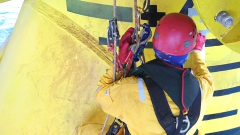 Working at height and overboard using abseiling technique. Stock Footage 83606102