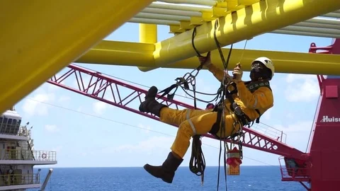 Working at height and overboard using abseiling technique. Video stock 83606106