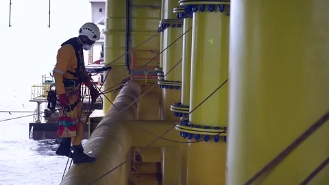 Working at height and overboard using abseiling technique. Stock Footage 83606410