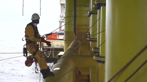 Working at height and overboard using abseiling technique. Video stock 83606417