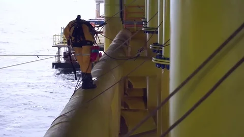 Working at height and overboard using abseiling technique. Video stock 83606422
