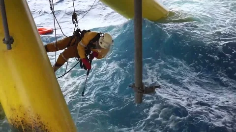 Working at height and overboard using abseiling technique. Stock Footage 83606428