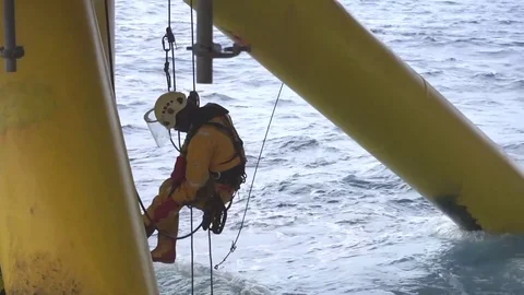 Working at height and overboard using abseiling technique. Stock Footage 83606429