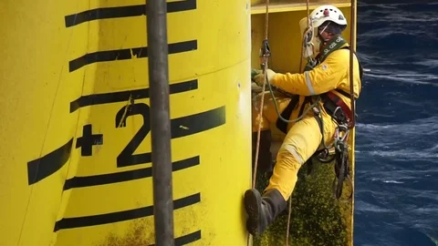 Working at height and overboard using abseiling technique. Stock Footage 83606444